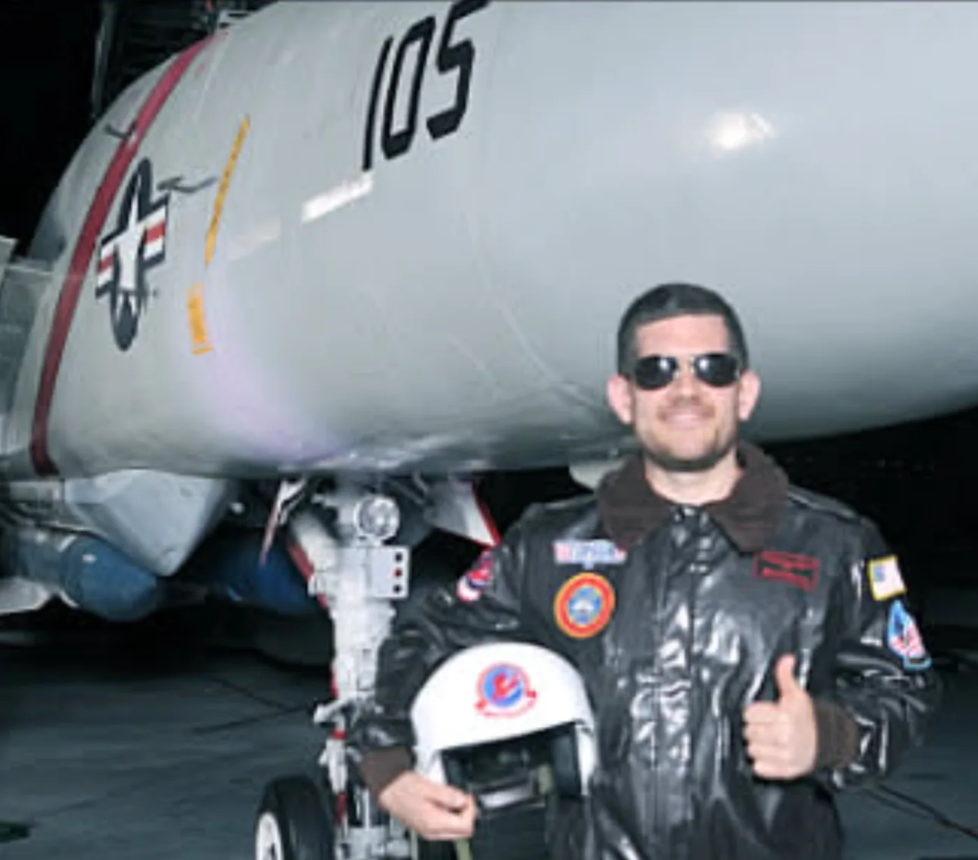 Matthew beside an F-14 Tomcat