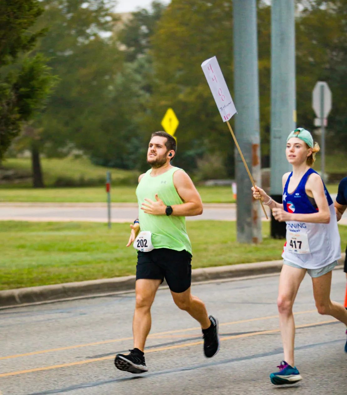 Matthew running a road race with fellow runners
